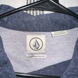 Blue Volcom polo style shirt. Size medium